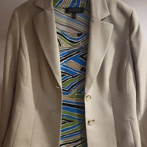 Blazer with sleeveless top.